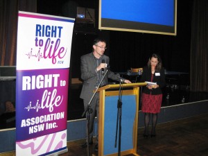 Councillor John Macaulay making presentation to Sophie York